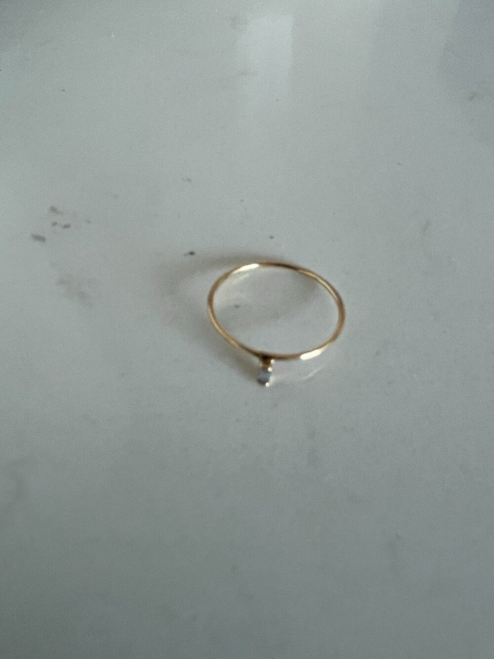 Jane Pope off set mini umba baguette ring